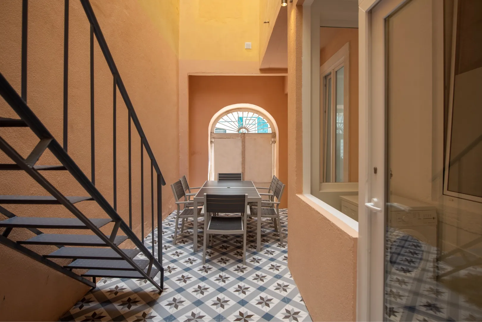 Kitchen with numbered cabinets and dining area